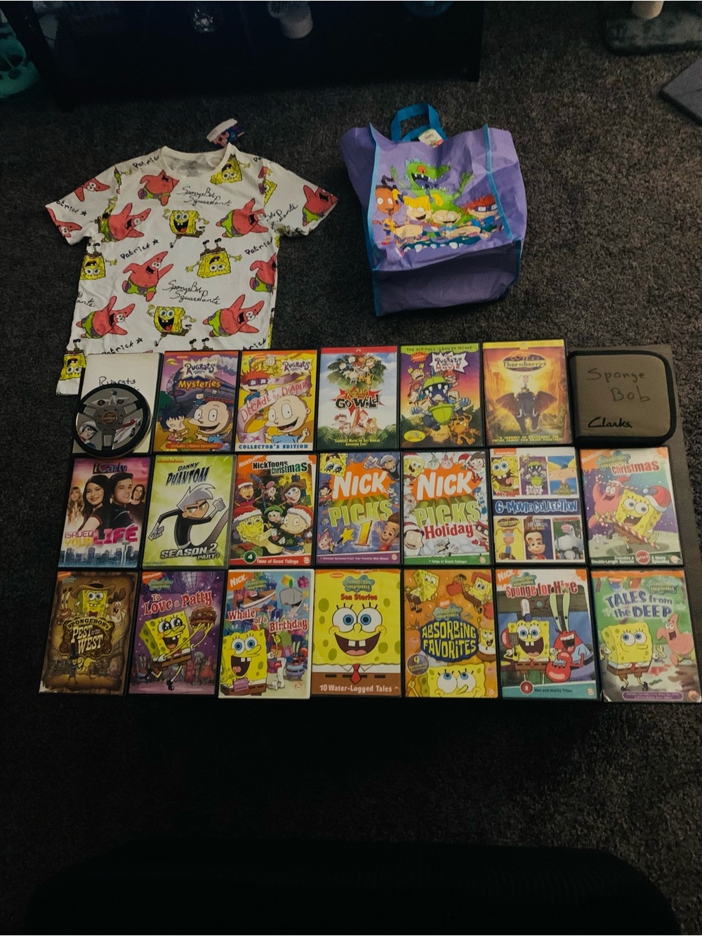 Nickelodeon Bundle 30+ DVDs, SpongeBob SquarePants Large Shirt, and Rugrats Bag.